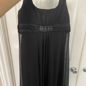 Long black David’s Bridal girls dress. Worn once.